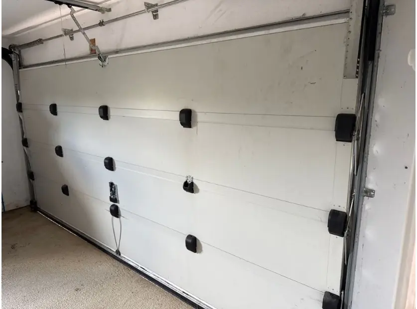 remise-en-etat-d-une-porte-sectionnelle-bloquee-en-position-fermee-a-trigny-51140